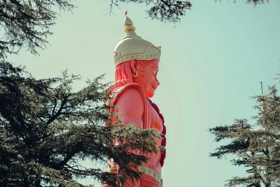 Close crop of the red Hanuman statue at Jakhoo Temple, Shimla